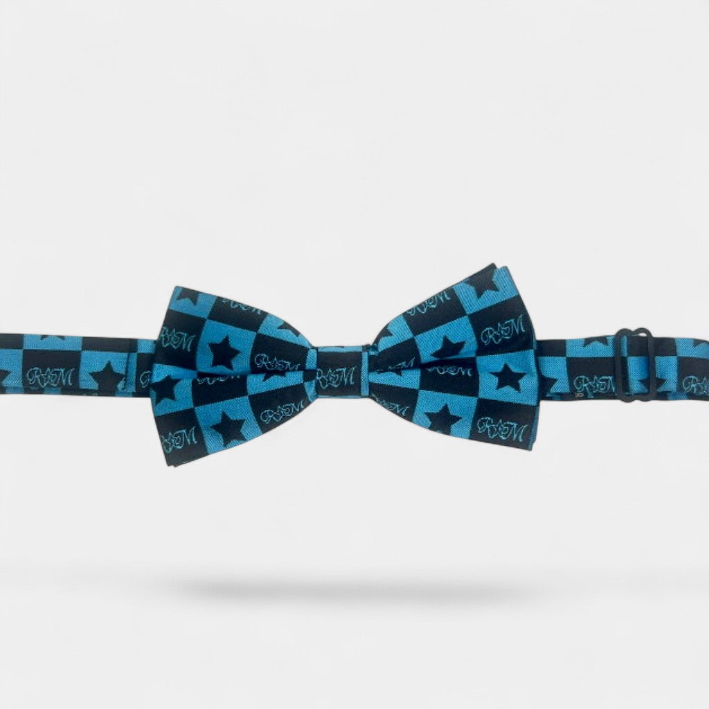 Aqua and black patterned bow tie on a gray background