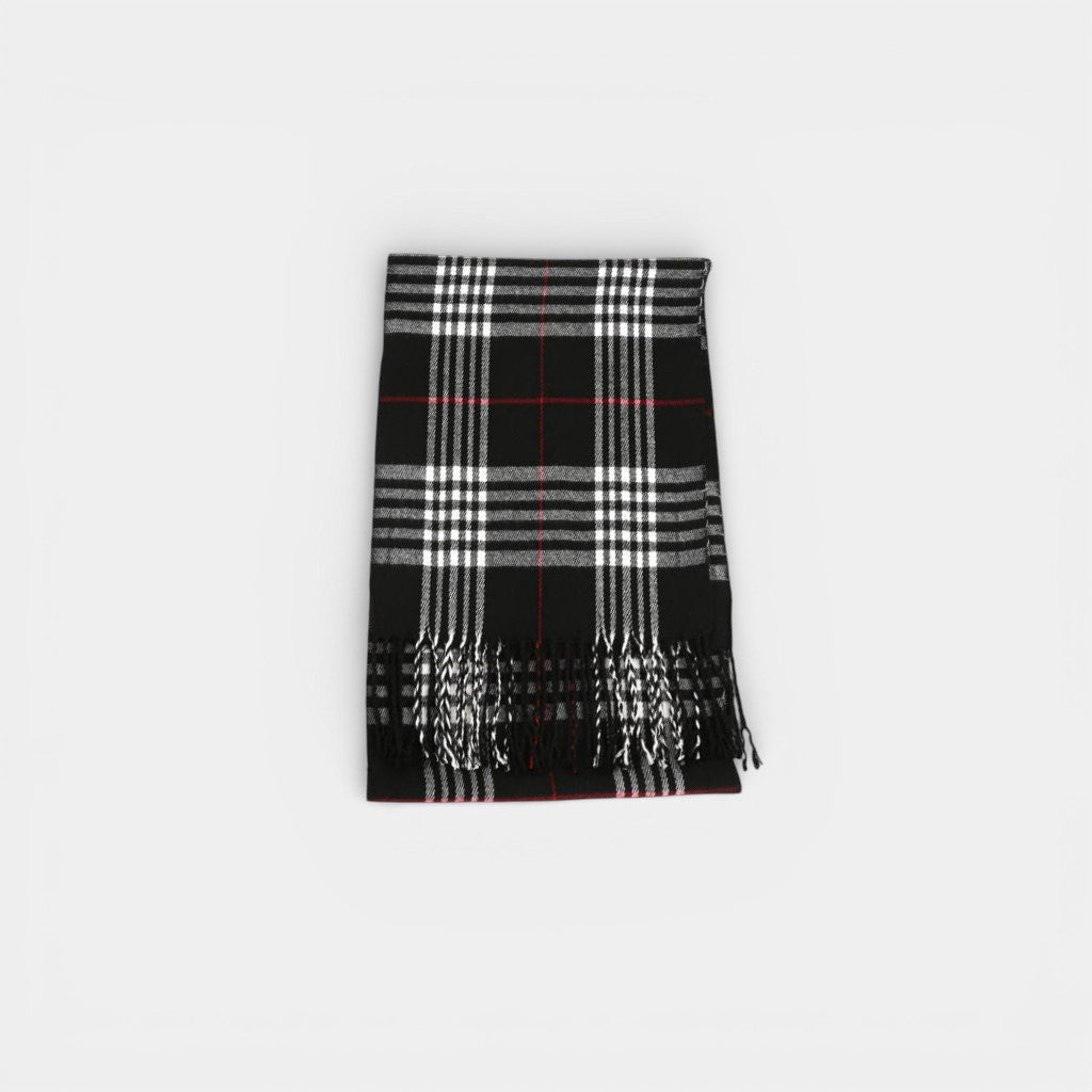 Black and white plaid scarf with red accents on a light gray background