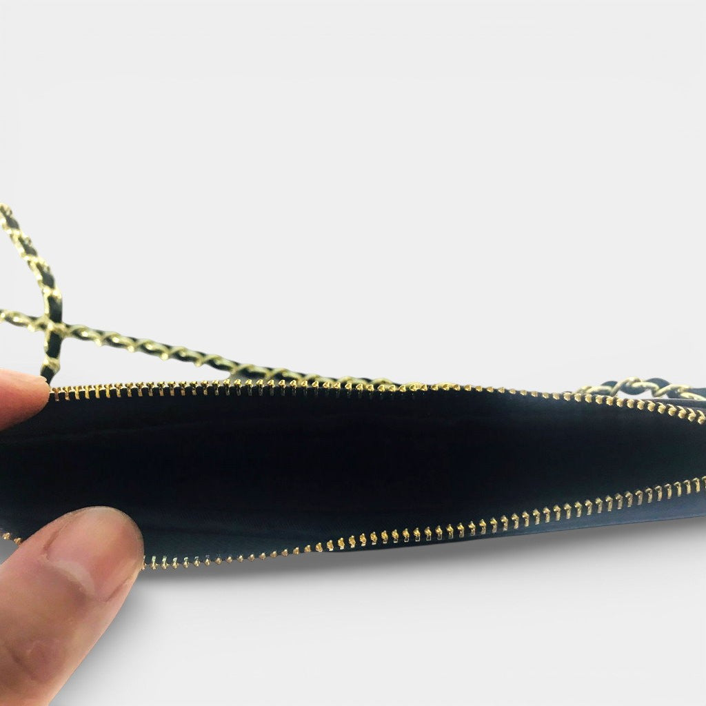 THE SIGNATURE CROSSBODY POUCH